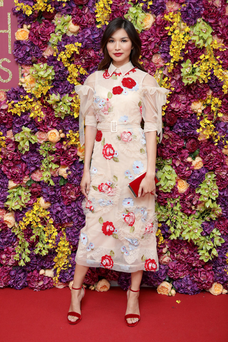 <p>Gemma Chan gave the fashion world one last glimpse of summer florals in a sheer midi dress at the UK premiere of ‘Crazy Rich Asians’ on 3 September. <em>[Photo: Freuds]</em> </p>