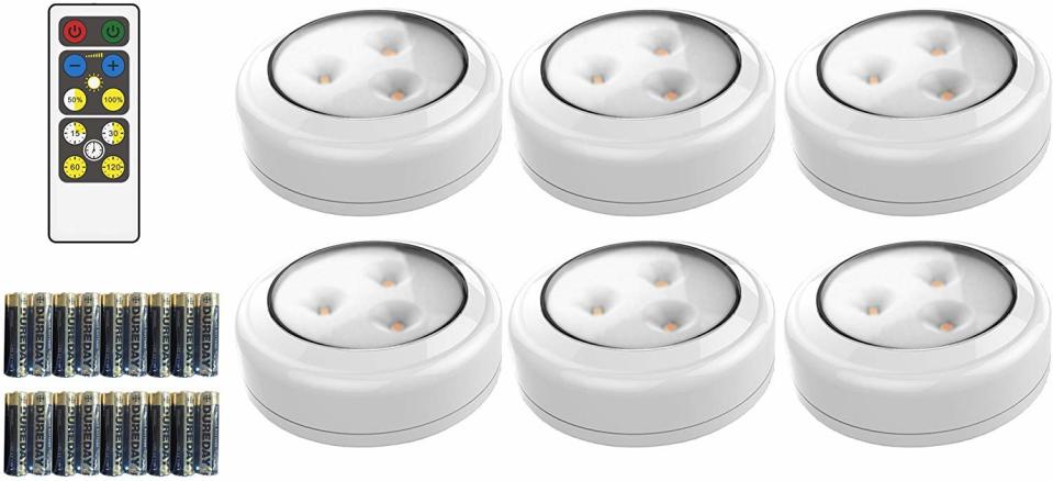 This six-pack of hockey puck-like lights provide serious illumination in small spaces. (Photo: Amazon)