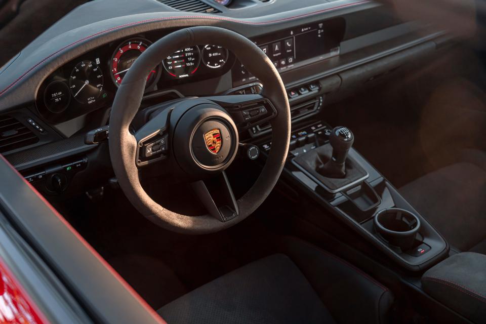 The interior of the Porsche 911 Carrera GTS, pictured with a manual transmission instead of a PDK.