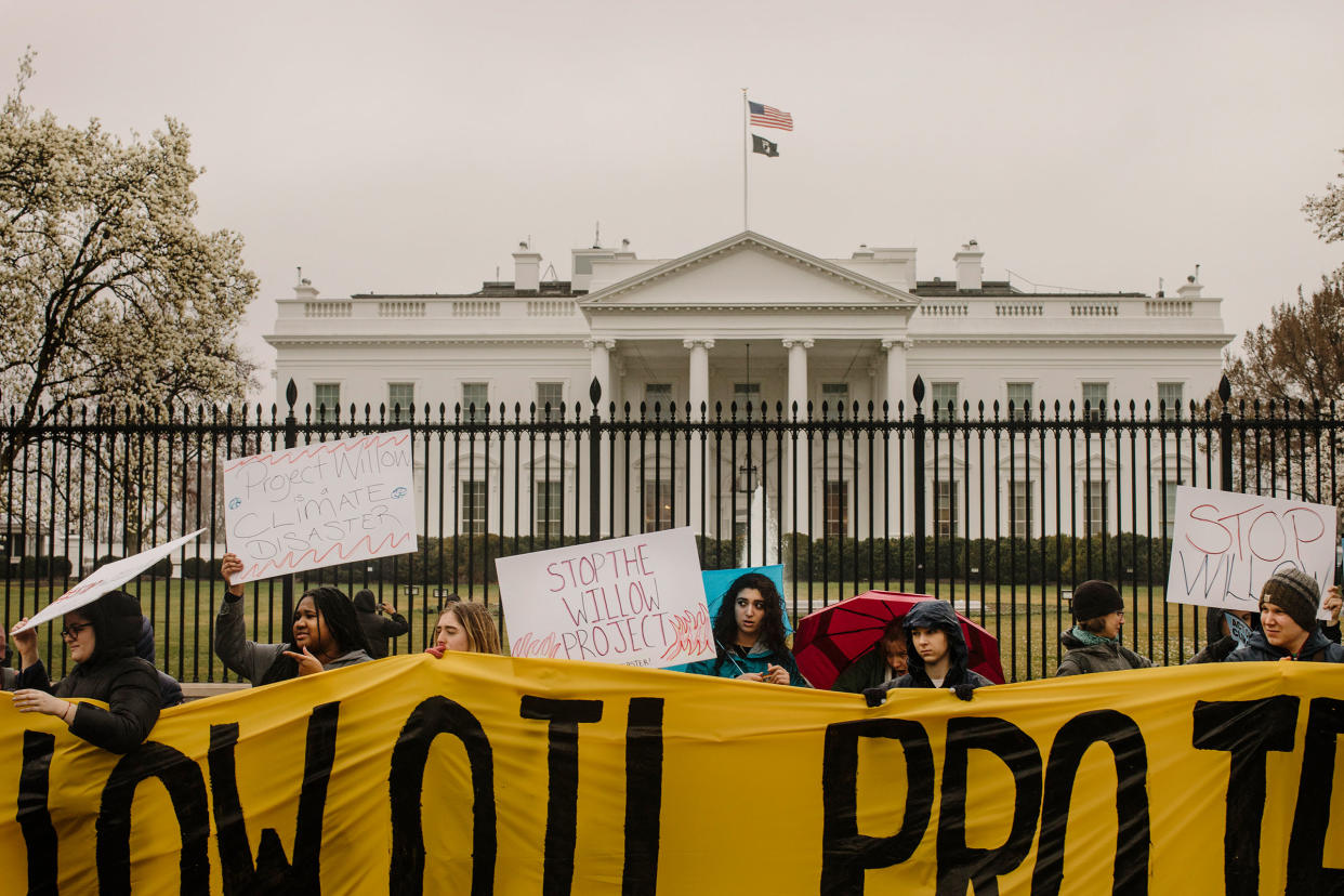 Activists gather outside the White House to call on President Joe Biden to halt the Willow Project in Alaska, in Washington on March 3, 2023. (Jason Andrew/The New York Times)