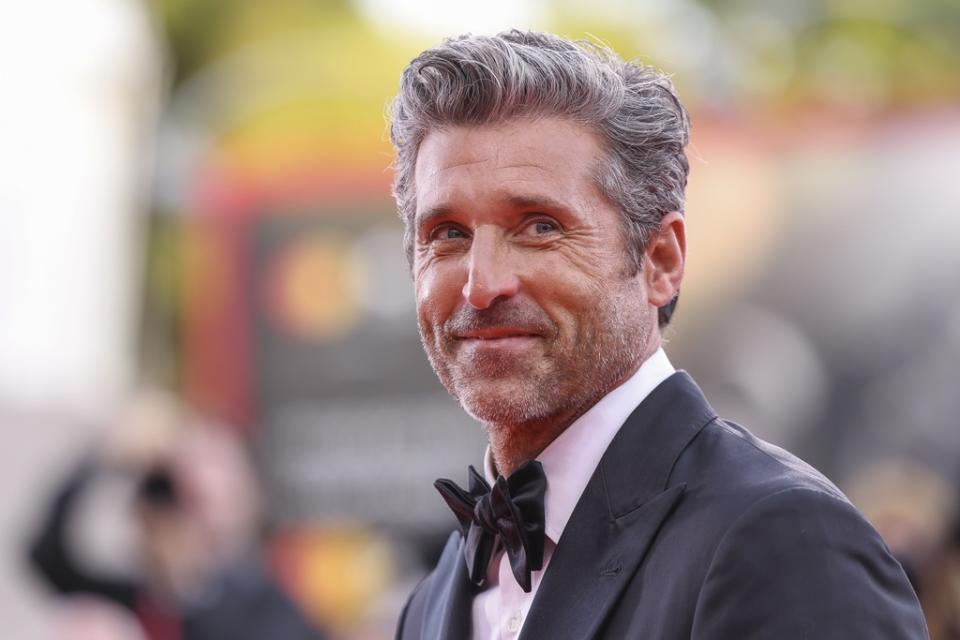 Patrick Dempsey poses for photographers upon arrival for the premiere of the film “Ferrari” during the 80th edition of the Venice Film Festival, Aug. 31, 2023, in Venice, Italy. On Tuesday, Nov, 7, People magazine named Dempsey as its Sexiest Man Alive. (Photo by Vianney Le Caer/Invision/AP, File)