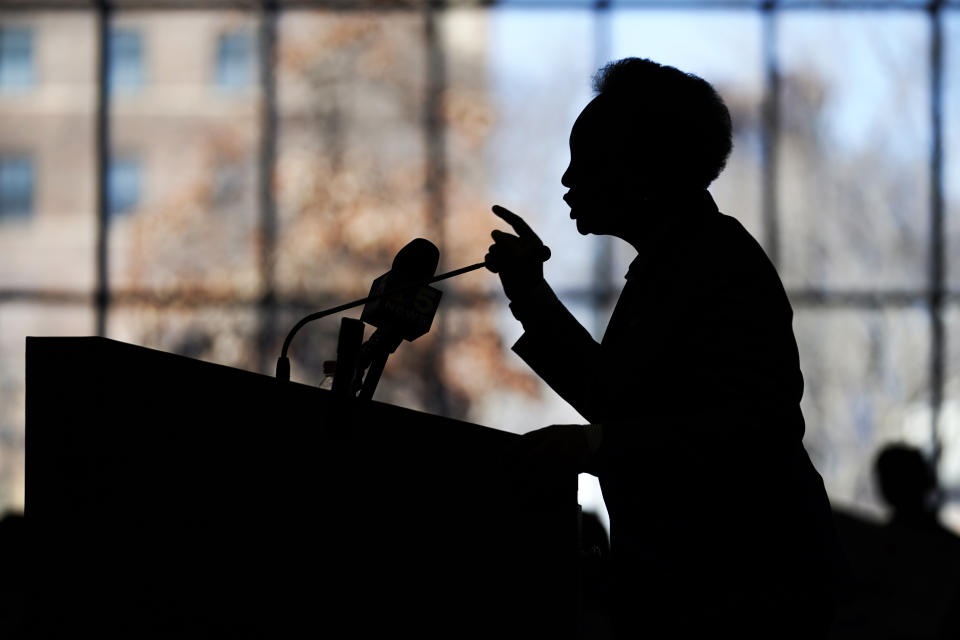 Chicago mayor Lori Lightfoot delivers her campaign speech in silhouette during a Women for Lori Rally in Chicago, Saturday, Feb. 25, 2023. Lightfoot is fighting for reelection Tuesday after a history-making but tumultuous four years in office and a bruising campaign threaten to make her the city's first one-term mayor in decades. (AP Photo/Nam Y. Huh)