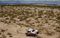 Dakar Rally - 2017 Paraguay-Bolivia-Argentina Dakar rally - 39th Dakar Edition - Fifth stage from Tupiza to Oruro, Bolivia 06/01/17. Stephane Peterhansel of France drives his Peugeot with his copilot Jean Paul Ottret. REUTERS/Ricardo Moraes