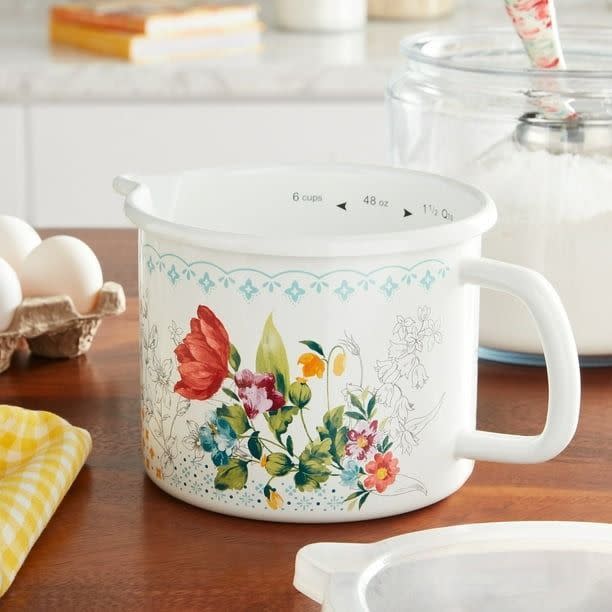 <p><a href="https://go.redirectingat.com?id=74968X1596630&url=https%3A%2F%2Fwww.walmart.com%2Fip%2FThe-Pioneer-Woman-Enamel-on-Steel-Measure-Cup%2F889149524&sref=https%3A%2F%2F" rel="nofollow noopener" target="_blank" data-ylk="slk:Shop Now;elm:context_link;itc:0;sec:content-canvas" class="link ">Shop Now</a></p><p>The Pioneer Woman Steel Measuring Cup</p><p>walmart.com</p><p>$10.44</p>