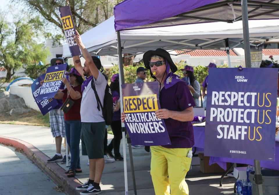 Healthcare workers picket outside of Desert Regional Medical Center in Palm Springs on July 25, 2023.