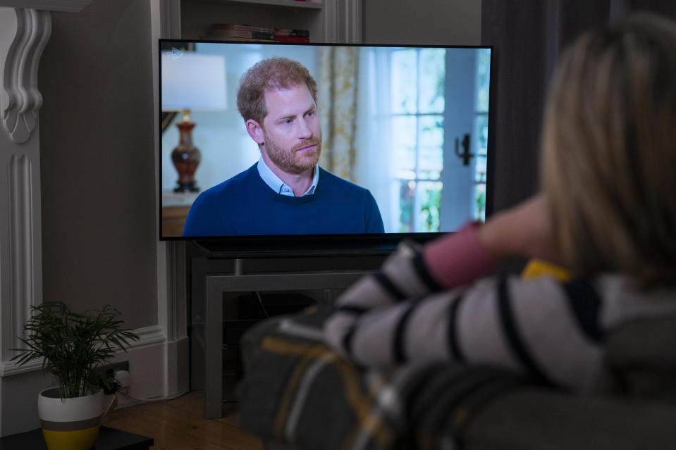 A person at home in Edinburgh watching the Duke of Sussex being interviewed by ITV's Tom Bradby during Harry: The Interview, two days before his controversial autobiography Spare is published. Picture date: Sunday January 8, 2023. (Photo by Jane Barlow/PA Images via Getty Images)