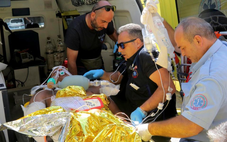 Medics transfer an man injured during an earthquake off the island of Kos, to the hospital of the city of Heraklion on the island of Crete - Credit: STEFANOS RAPANIS/Reuters