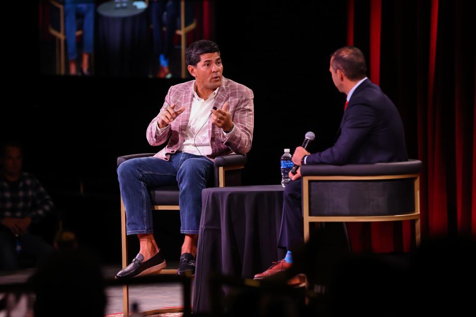 Former New England Patriot and three-time Super Bowl champion Tedy Bruschi talks with emcee Mike Mutnansky at The Brook Casino in Seabrook Wednesday, Sept. 27, 2023. Bruschi spoke about his 13-year NFL career and his foundation Tedy's Team.