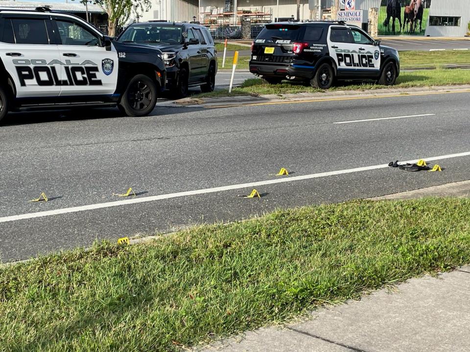 Evidence markers were placed in the roadway at the site of a fatal hit-and-run crash on West State Road 40.