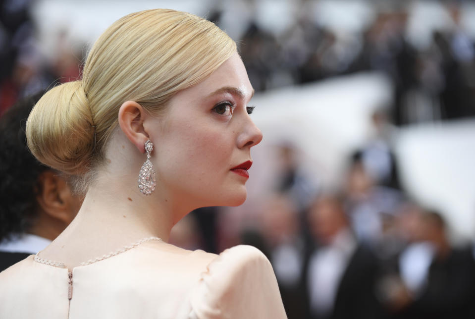 Jury member Elle Fanning poses for photographers upon arrival at the opening ceremony and the premiere of the film 'The Dead Don't Die' at the 72nd international film festival, Cannes, southern France, Tuesday, May 14, 2019. (Photo by Arthur Mola/Invision/AP)
