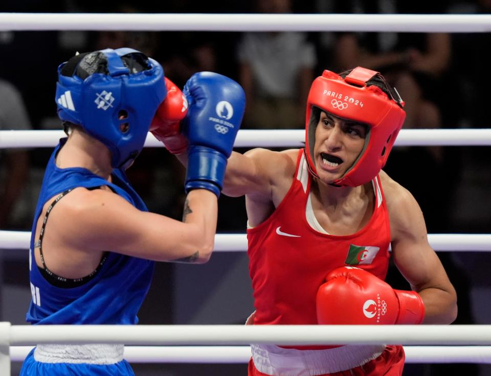 August 3, 2024;  Paris, France;  Imane Khelif (ALG) competes against Anna Luca Hamori (HUN) in the women's 66kg boxing quarterfinals during the Paris 2024 Summer Olympics at the North Paris Arena.  Mandatory Credit: Katie Goodale-USA TODAY Sports