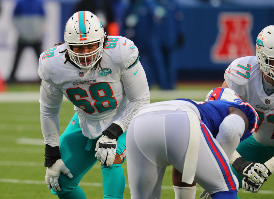 Robert Hunt, left, could be a breakout player for the Miami Dolphins in 2021. (Photo by Timothy T Ludwig/Getty Images)