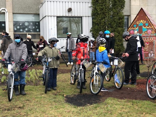 Some newcomers in Fredericton received new bikes on Saturday. (Gary Moore/CBC - image credit)