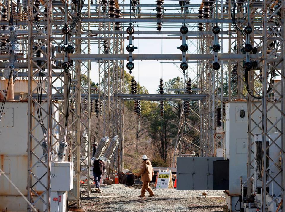 Crews work at an energy substation on Thursday, Jan. 18, 2024, in Durham, N.C. where an equipment failure during maintenance work on Wednesday caused a power outage to about 11,500 Duke Energy customers.