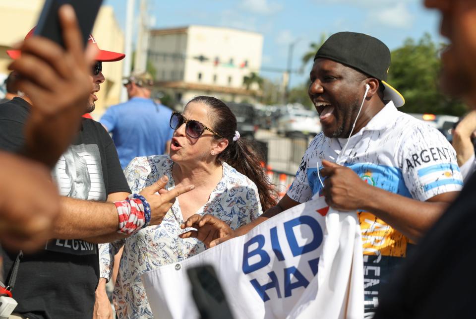 A heated discussion erupted between a Biden supporter and Trump supporters outside the federal courthouse during Trump's classified documents sealed hearing in Fort Pierce on Monday, Feb, 12, 2024.