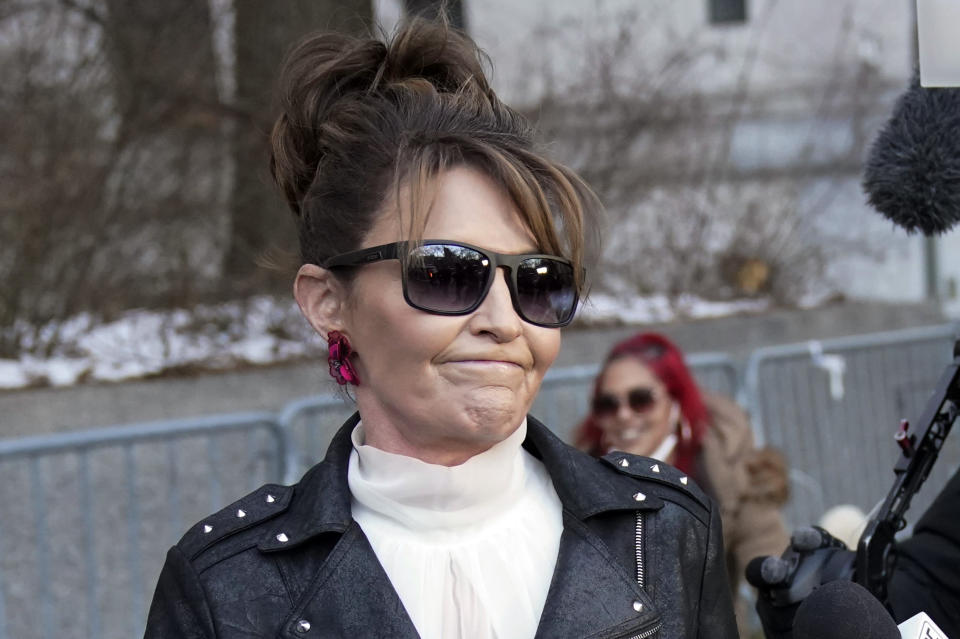 FILE — Former Alaska Gov. Sarah Palin reacts as she leaves a courthouse in New York, Monday, Feb. 14, 2022. Palin lost her libel lawsuit against The New York Times on Tuesday, Feb. 15, 2022, when a jury rejected her claim that the newspaper maliciously damaged her reputation by erroneously linking her campaign rhetoric to a mass shooting. (AP Photo/Seth Wenig, File)