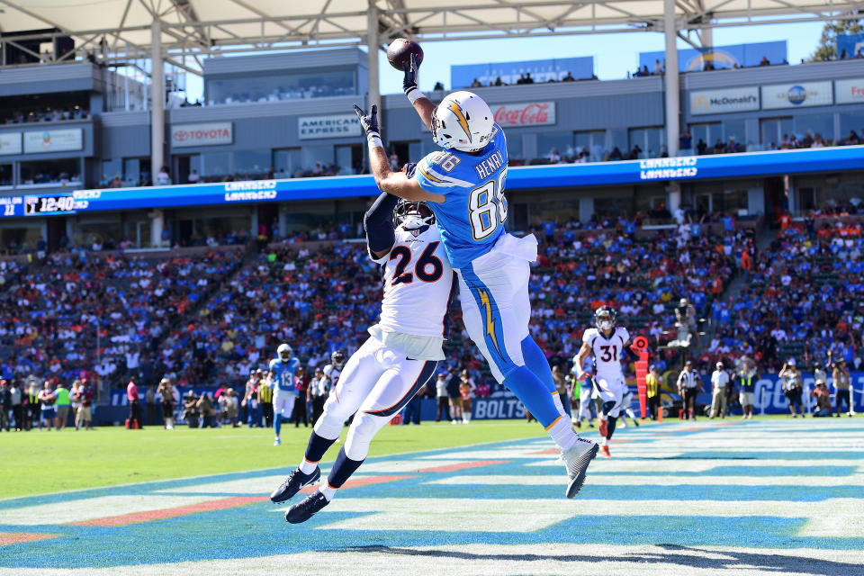 <p>Darian Stewart #26 of the Denver Broncos interferes with the pass from Hunter Henry #86 of the Los Angeles Chargers during the first quarter at the StubHub Center on October 22, 2017 in Carson, California. (Photo by Harry How/Getty Images) </p>