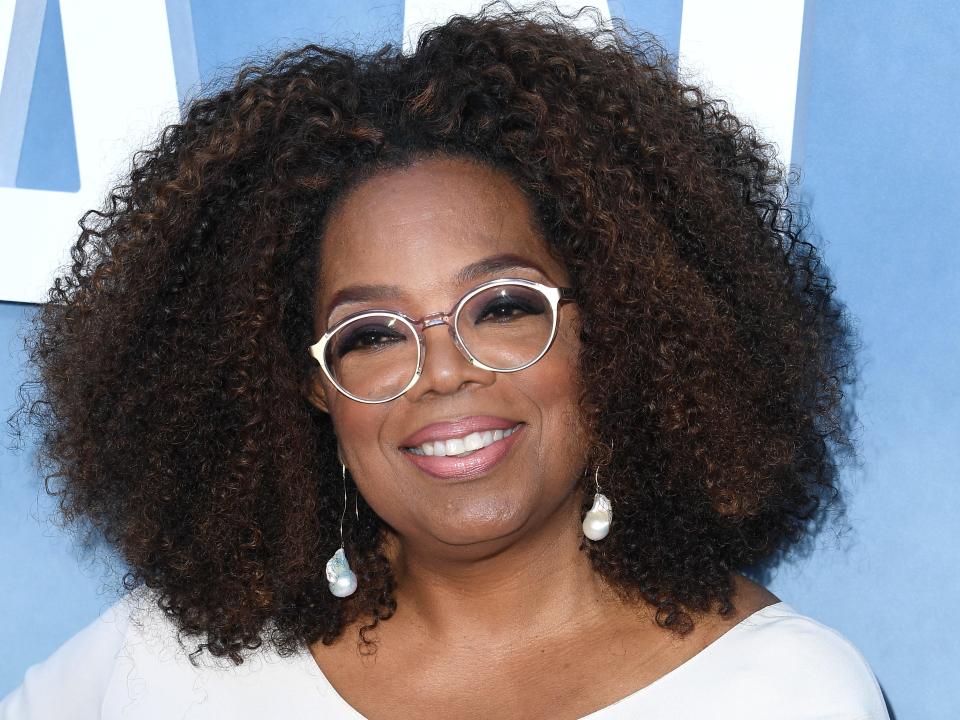 Oprah Winfrey walking the red carpet of the premiere of "David Makes Man" in 2019.