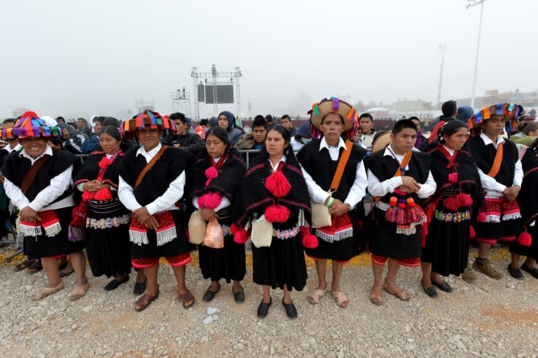 Chamula's indigenous people attend the open-air mass officiated by Pope Francis in San Cristobal de Las Casas, Chiapas state, Mexico, on February 15, 2016