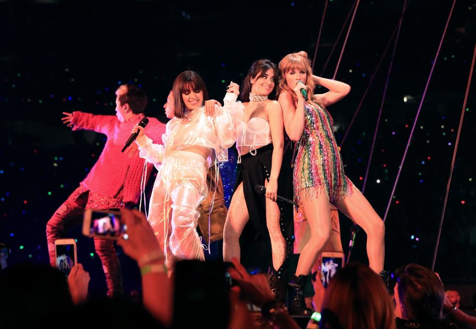 Left-right: Charli XCX, Camila Cabello and Taylor Swift perform on the opening night of her 'Reputation' world tour: Getty