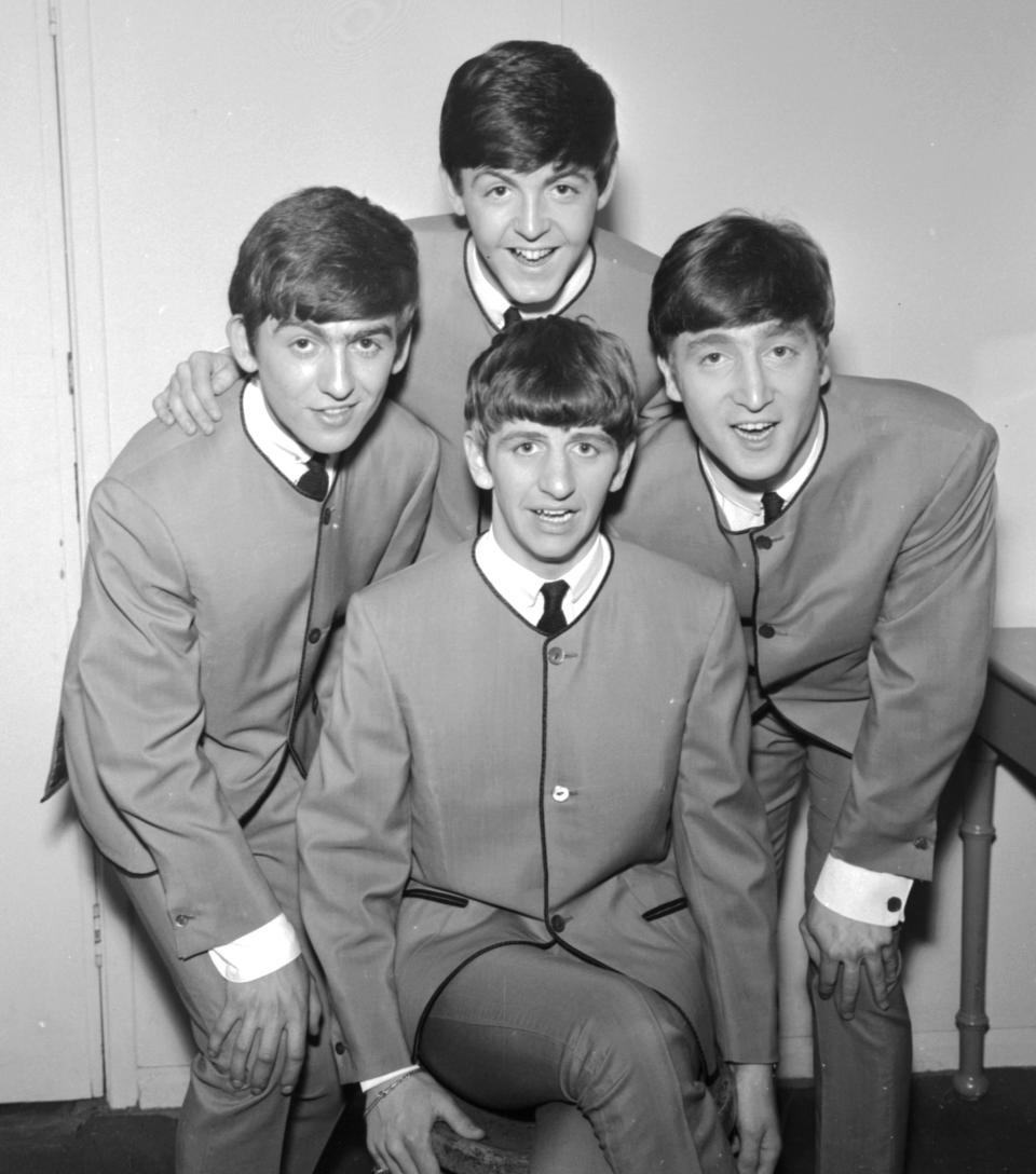 Who could forget the Beatles' famous mop tops? Never has helmet hair been so beloved. 