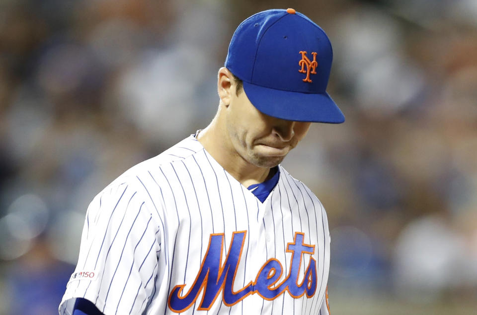 New York Mets' starting pitcher Jacob deGrom leaves the field after allowing a three-run home run to Chicago Cubs' Victor Caratini during the seventh inning of a baseball game Thursday, Aug. 29, 2019, in New York. (AP Photo/Kathy Willens)