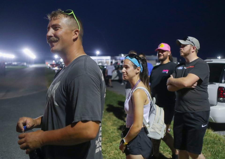Organizers of the informal meetups of car enthusiasts at Pit Daddy's BBQ outside Smyrna (from left) Jake Voshell, Sami Lupacchino, Cole Cordell and Joe Deladvitch watch cars come and go during a recent gathering.
(Credit: William Bretzger-Delaware News Journal)