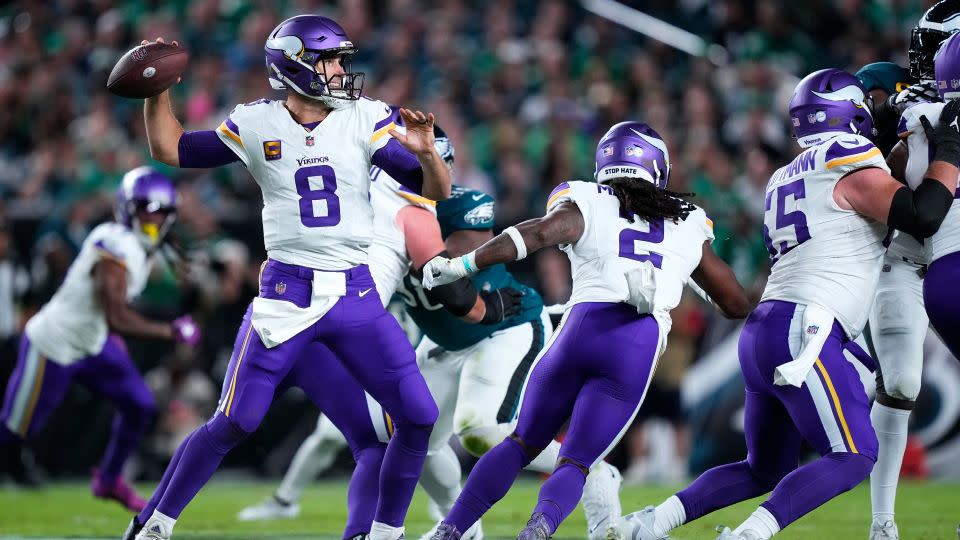 Minnesota Vikings quarterback Kirk Cousins looks to pass during the first half against the Philadelphia Eagles. - Matt Rourke/AP