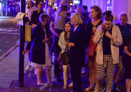 <p>People walking down Borough High Street as police are dealing with an incident on London Bridge in London, Saturday, June 3, 2017. Witnesses reported a vehicle hitting pedestrians and injured people on the ground. (Dominic Lipinski/PA via AP) </p>