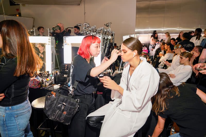 A model backstage is prepared for the Tom Ford AW20 Show at Milk Studios in Los Angeles