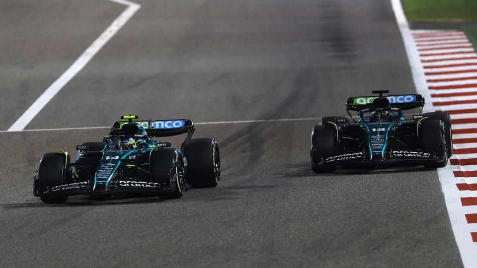 Aston Martin drivers Fernando Alonso (left) and Lance Stroll (right) during the 2024 Bahrain Grand Prix. 