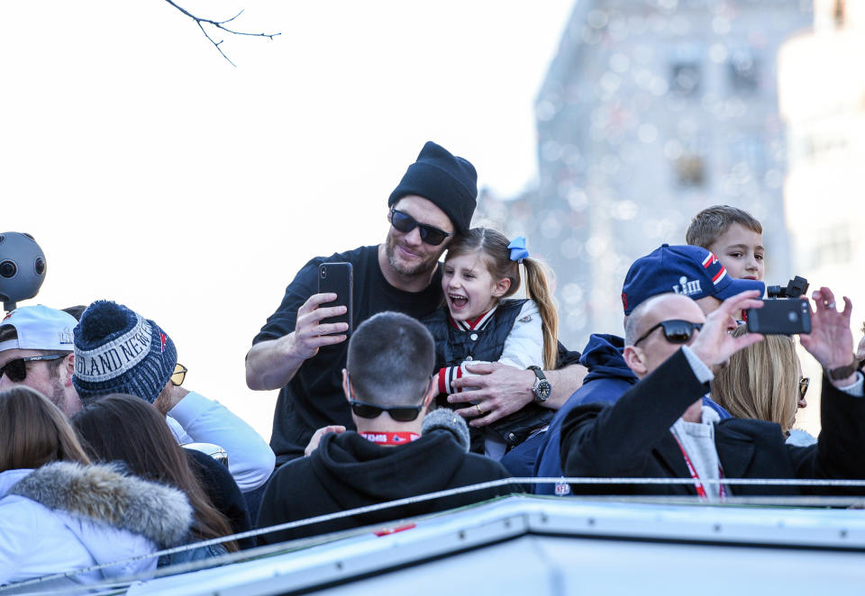 BOSTON, MA - FEBRUARY 5: Tom Brady and his daughter Vivian celebrate with thousands of fans who lined the streets of Boston to celebrate with the New England Patriots during their victory parade. February 5, 2019   (Photo By Faith Ninivaggi/ Boston Herald/ MediaNews Group via Getty Images)