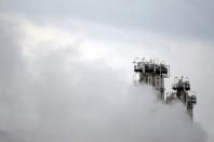 FILE - This Jan. 15, 2011 file photo, shows a part of Arak heavy water nuclear facilities, near the central city of Arak, 150 miles (250 kilometers) southwest of the capital Tehran, Iran. Iran will break the uranium stockpile limit set by Tehran's nuclear deal with world powers in the next 10 days, the spokesman for the country's atomic agency said Monday June 17, 2019, while also warning that Iran has the need for uranium enriched up to 20%, just a step away from weapons-grade levels. (Mehdi Marizad/Fars News Agency via AP, File)