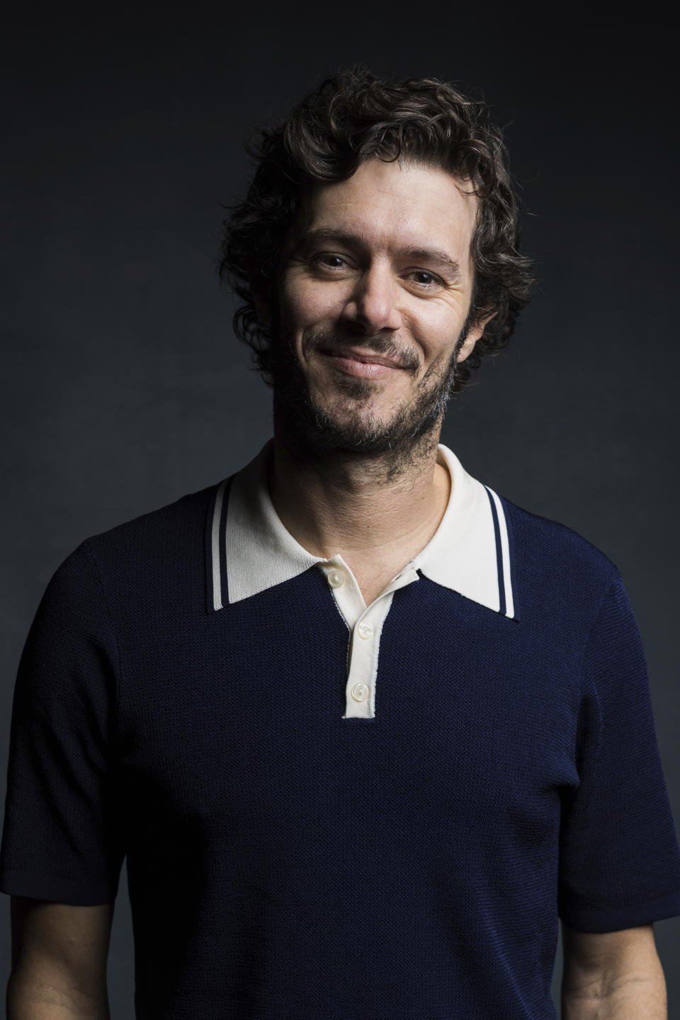 Adam Brody poses for a portrait to promote the film "Shazam! Fury of the Gods" at The London Hotel in West Hollywood, Calif., on Monday, Feb. 27, 2023. (Photo by Willy Sanjuan/Invision/AP)