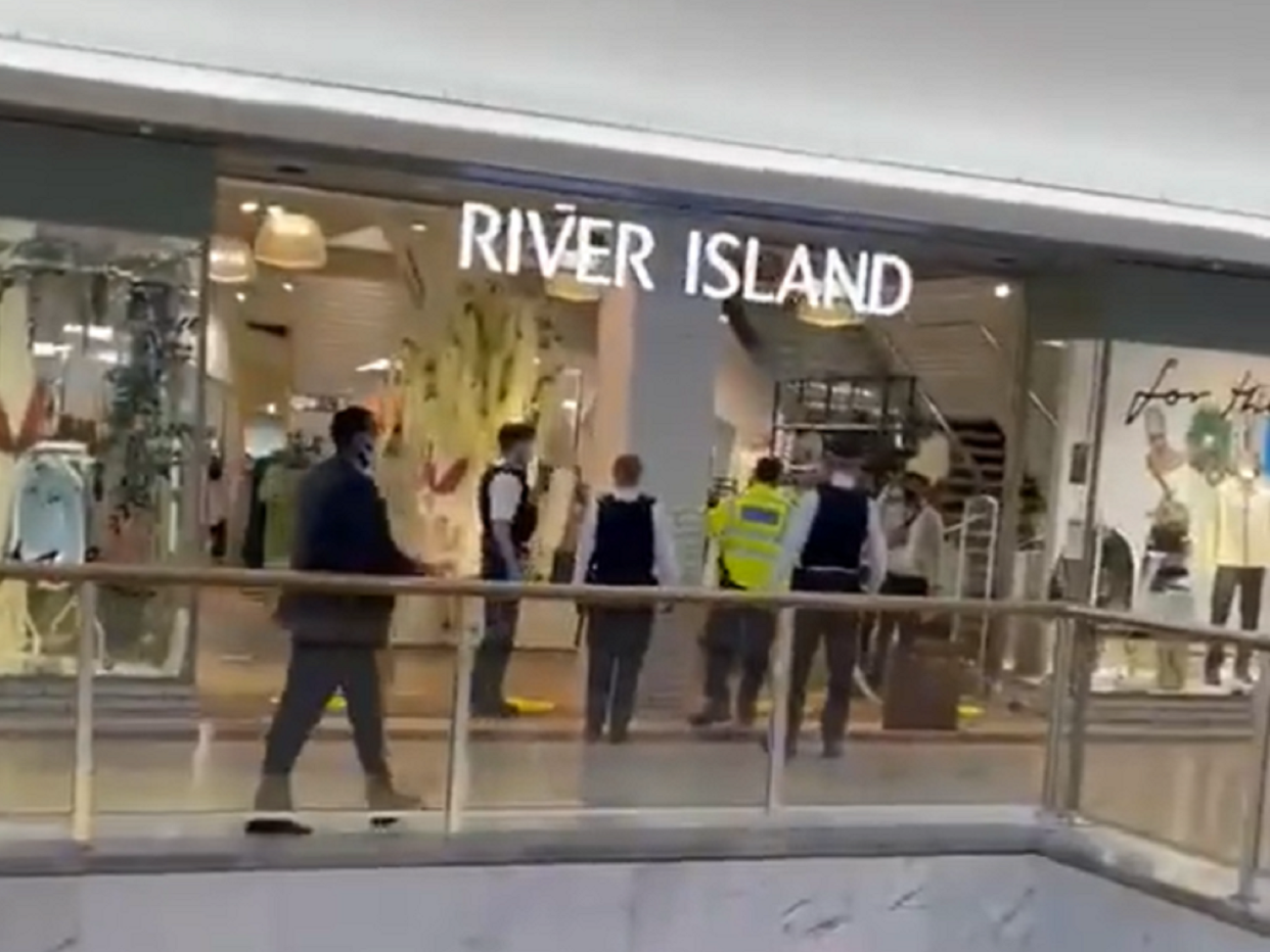 Video footage from inside Brent Cross Shopping Centre in north London appears to show a police cordon after a 21-year-old man was stabbed to death. (Shneor Crombie/@MrShneor/Twitter)