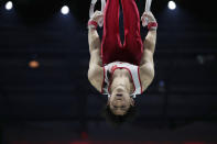 Daiki Hashimoto of Japan competes on the rings at the Men's All-Around Final during the Artistic Gymnastics World Championships at M&S Bank Arena in Liverpool, England, Friday, Nov. 4, 2022. (AP Photo/Thanassis Stavrakis)