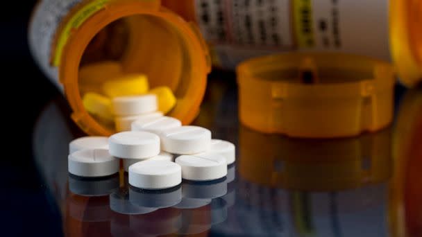 PHOTO: Opioid painkiller tablets spill out of a prescription bottle in an undated stock image. (STOCK PHOTO/Getty Images)
