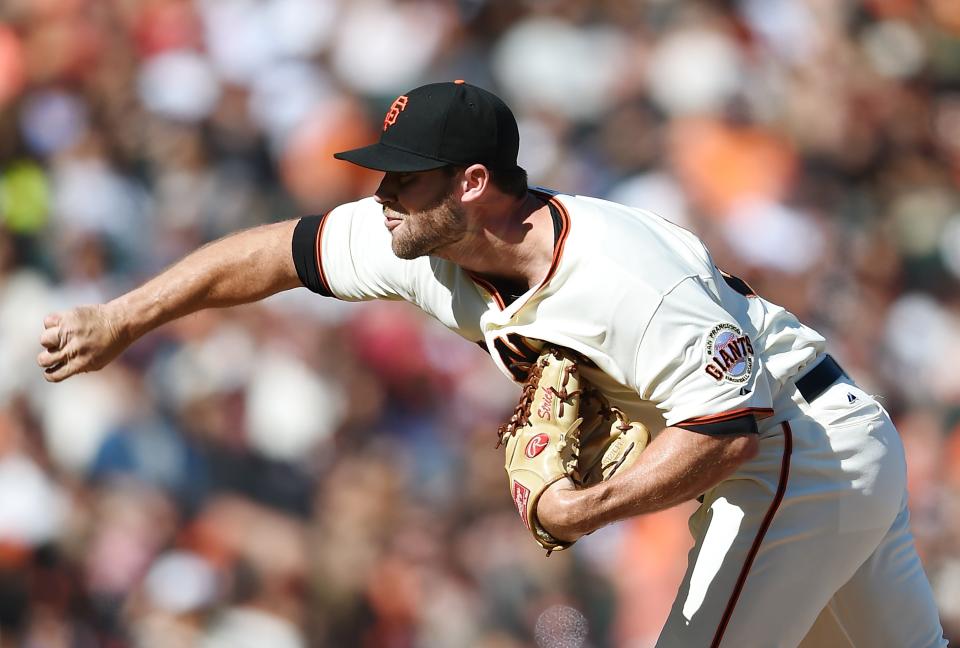 SAN FRANCISCO, CA - SEPTEMBER 27: Hunter Strickland #60 of the San Francisco Giants pitches against the San Diego Padres in the top of the eighth inning at AT&T Park on September 27, 2014 in San Francisco, California. The Giants won the game 3-1. (Photo by Thearon W. Henderson/Getty Images)