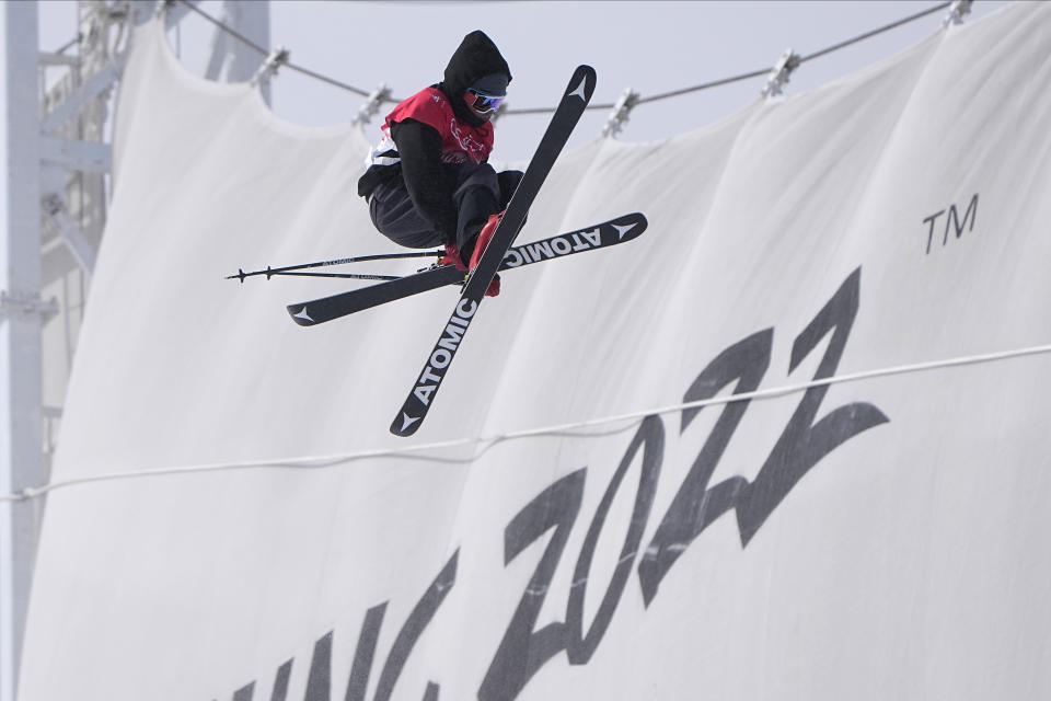 Britain's Gus Kenworthy competes during the men's halfpipe finals at the 2022 Winter Olympics, Saturday, Feb. 19, 2022, in Zhangjiakou, China. (AP Photo/Gregory Bull)