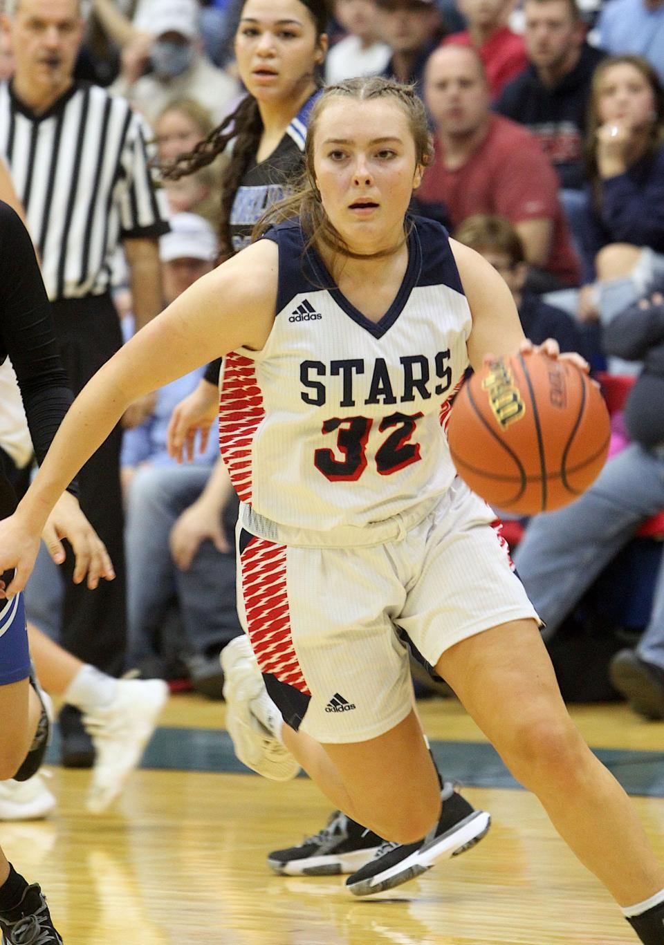 Bedford North Lawrence's Madisyn Bailey (32) drives to the basket during the IHSAA regional basketball game against Franklin Community on Saturday, Feb. 12, 2022.