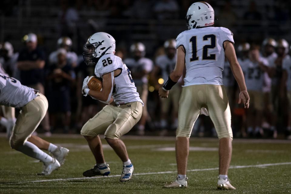 Council Rock South junior Chase Myers carries the ball against Pennsbury at Harry S. Truman High School in Levittown on Friday, Sept. 9, 2022. The Falcons defeated the Golden Hawks 41-6.