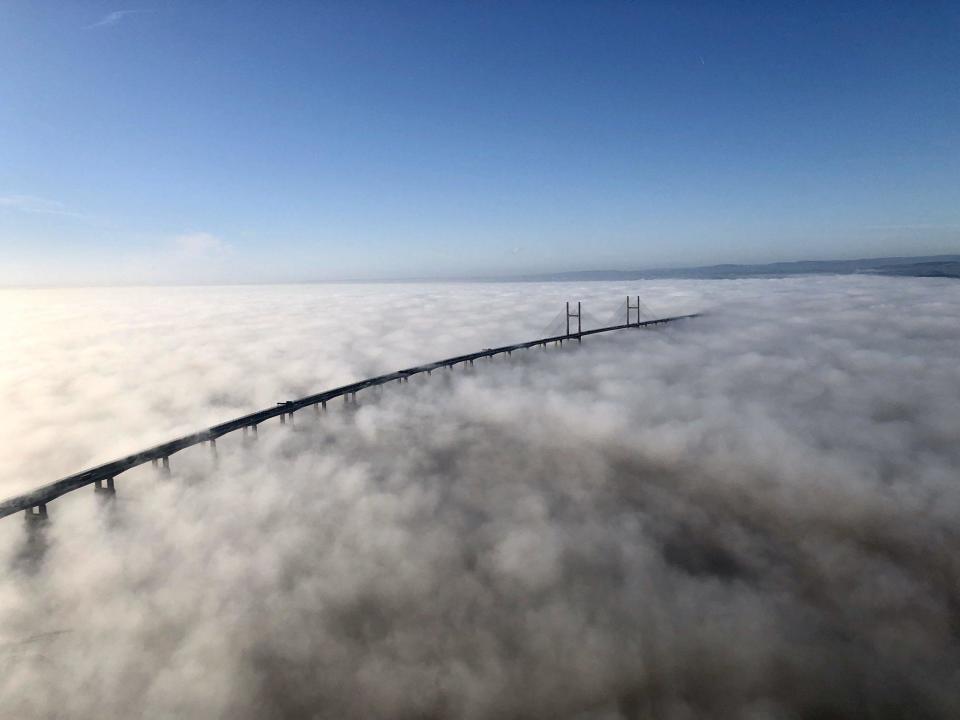 Aerial images captured by a National Police Air Service helicopter show the Severn Bridge, which links Wales and England, shrouded in fog, 21 January, 2020. The fog is believed to have been caused by a phenomenon known as temperature inversion: NPAS South West