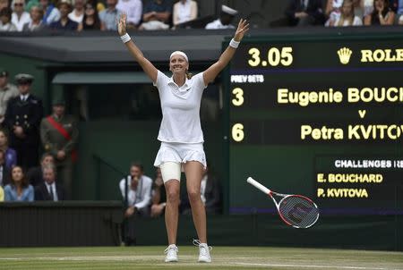 Petra Kvitova of the Czech Republic celebrates after defeating Eugenie Bouchard of Canada in their women's singles final tennis match at the Wimbledon Tennis Championships, in London