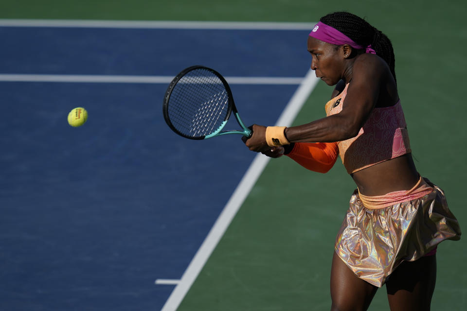 Coco Gauff, of the United States, hits a backhand to Paula Badosa, of Spain, at the Mubadala Silicon Valley Classic tennis tournament in San Jose, Calif., Friday, Aug. 5, 2022. (AP Photo/Godofredo A. Vásquez)