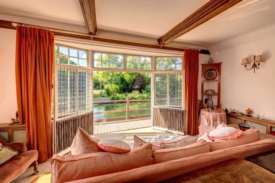 The house's reception rooms look out over the river (Hamptons)