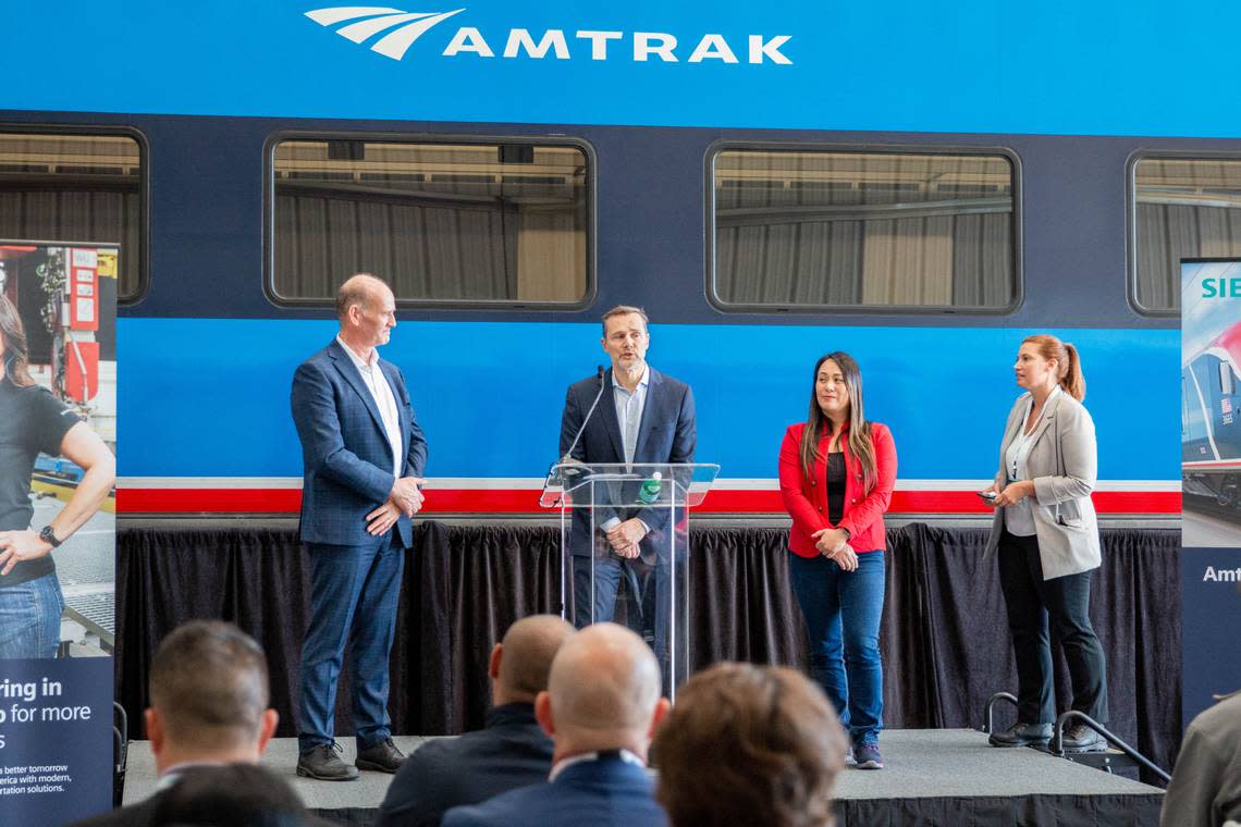 Amtrak President Roger Harris speaks in front of the first Amtrak Airo train car at the Siemens Mobility manufacturing facility in Sacramento on Wednesday, Oct. 11, 2023.