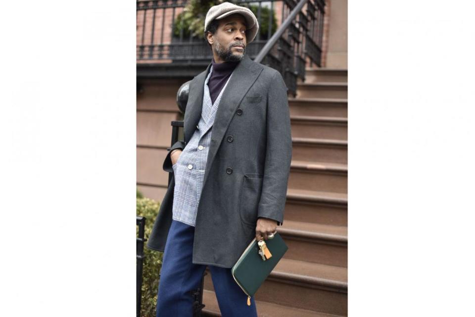 New York street style influencer Karl-Edwin Guerre with Ettinger zip pouch (Ettinger )