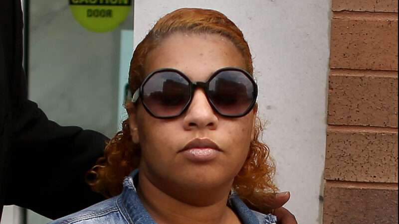 Deja Taylor after her state arraignment in April