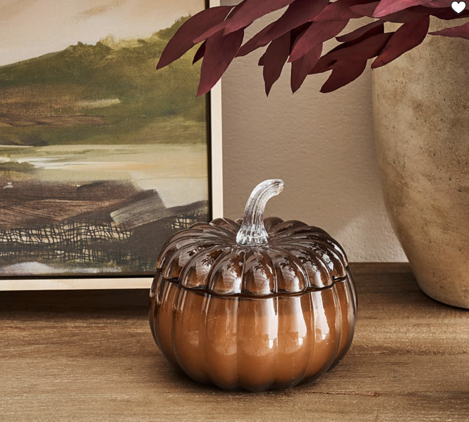 <p><a href="https://go.redirectingat.com?id=74968X1596630&url=https%3A%2F%2Fwww.potterybarn.com%2Fproducts%2Fglass-candle-pumpkin-harvest-spice%2F%3FcatalogId%3D84%26sku%3D3321306&sref=https%3A%2F%2Fwww.thepioneerwoman.com%2Fhome-lifestyle%2Fentertaining%2Fg32392289%2Ffall-candles%2F" rel="nofollow noopener" target="_blank" data-ylk="slk:Shop Now;elm:context_link;itc:0;sec:content-canvas" class="link ">Shop Now</a></p><p>Handcrafted Pumpkin Lidded Recycled Glass Candle</p><p>$39.50</p><span class="copyright">Pottery Barn</span>