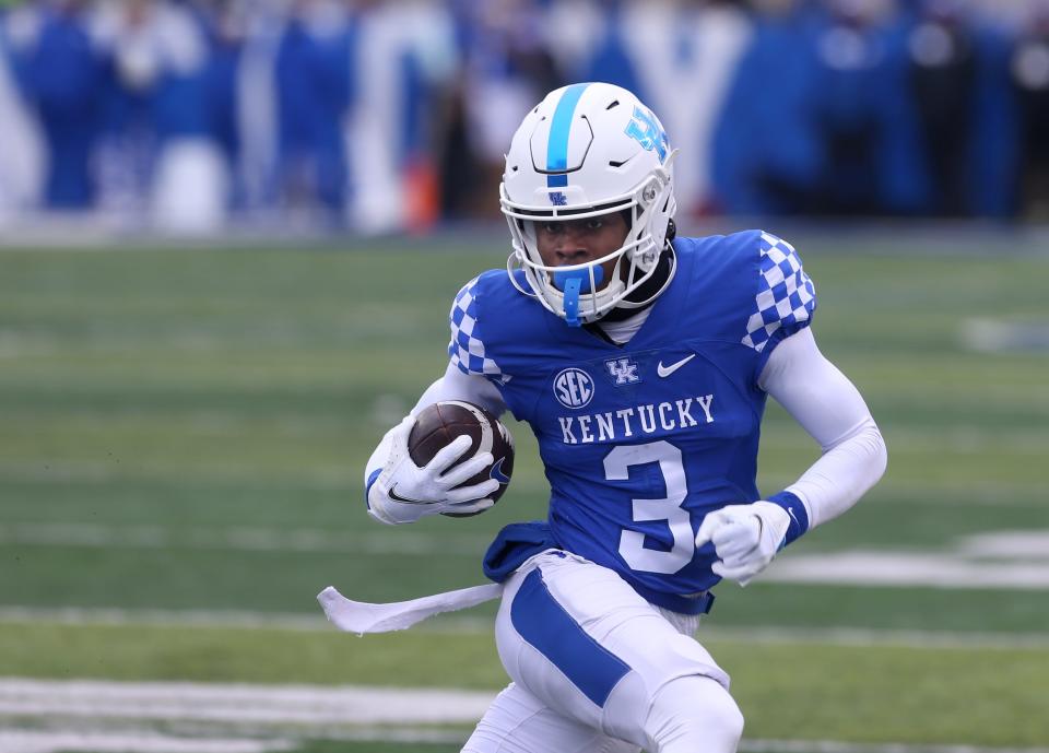 In this file photo from Nov. 12, 2022, Kentucky receiver Dekel Crowdus runs with the ball after catching a pass against Vanderbilt. Crowdus entered the transfer portal after three seasons with the Wildcats.